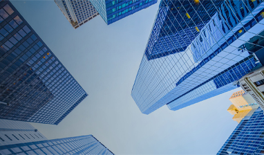 Upward angle of skyscrapers against a clear sky