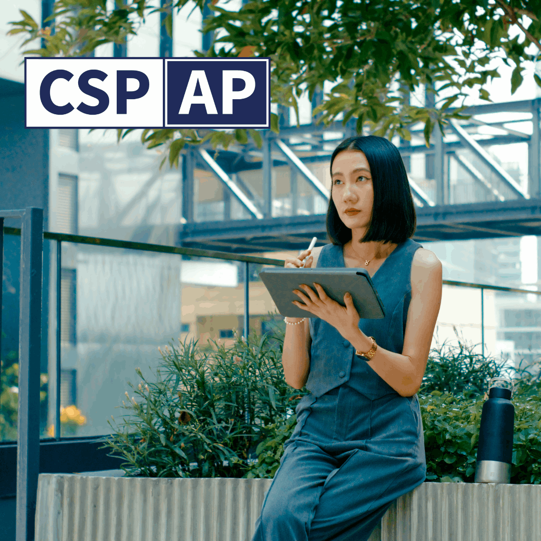 Woman sitting in front of buildings and greenery next to CSP-AP logo